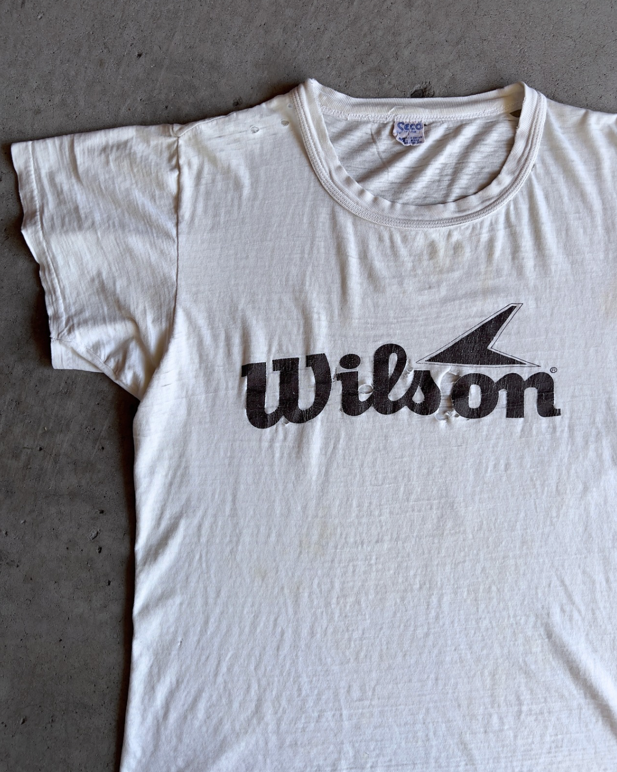 1970s Wilson Sporting Goods Threadbare Tee - Shop ThreadCount Vintage Co.