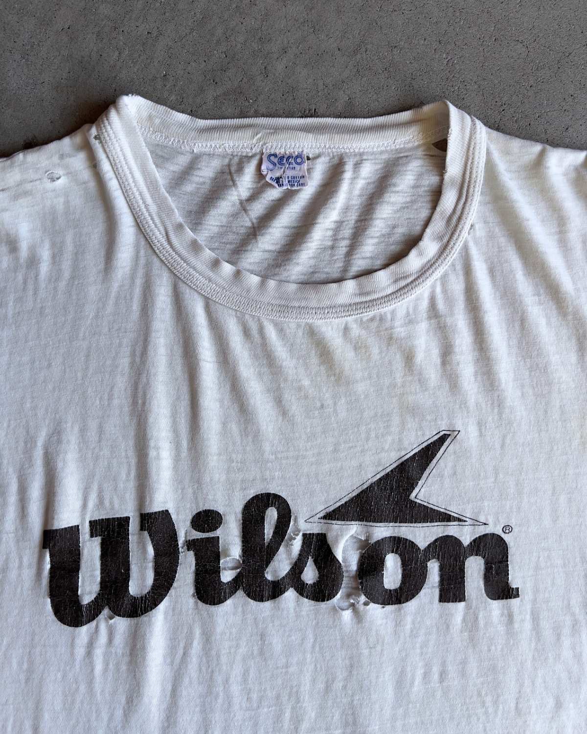 1970s Wilson Sporting Goods Threadbare Tee - Shop ThreadCount Vintage Co.