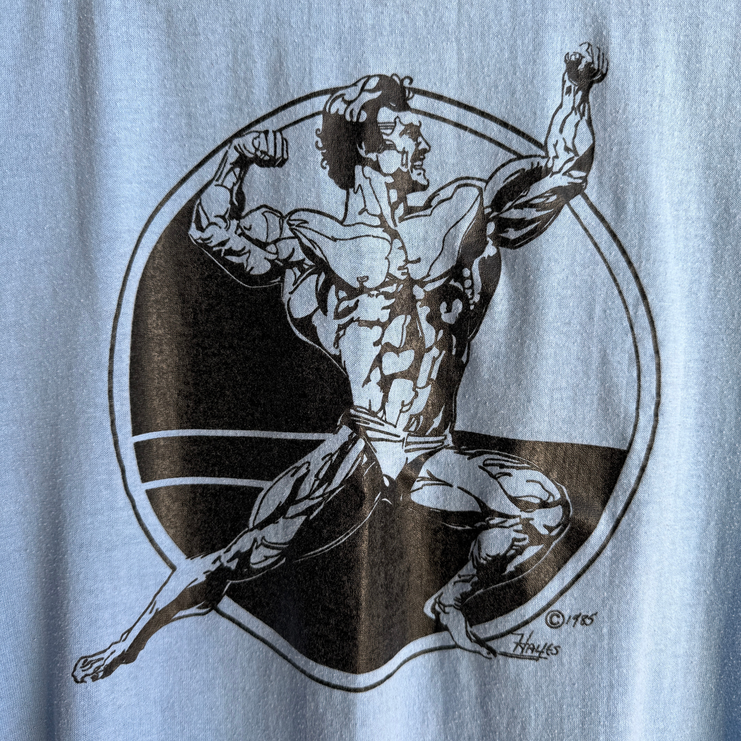 1985 Bodybuilder Pose Graphic Tee